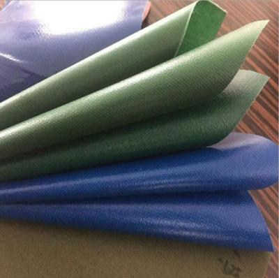 China 100% Polyester 610g Vinyl Coated PVC Tarpaulin Fabric Super Heavy Duty 18oz for sale