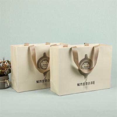 China Bestyle Recyclable Custom Paper Gift Bags Shopping Tea Paper Bag With Handle for sale