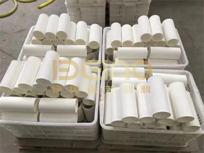 China Tubo de codo cerámico de alumina anti desgaste Tubo revestido de cerámica para construcción en venta