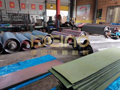 China Custom Ceramic Lagging Sheet Anti Skid Ceramic Lagging Conveyor Pulley for sale