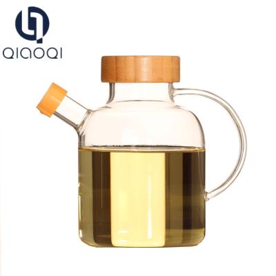China Glass oil and vinegar cruet with bamboo lids for sale