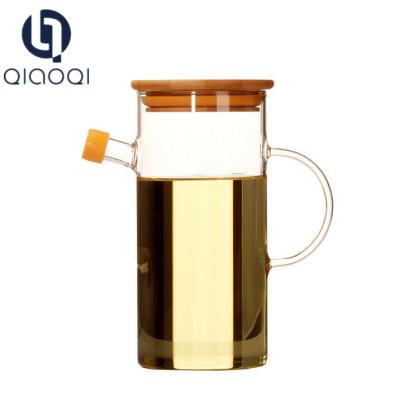 China kitchenware custom wholesale jar glass honey pot with handle glass oil dispenser for sale
