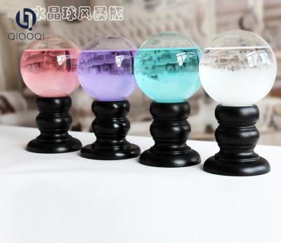 China Crystal ball weather forecast bottle with wooden base for sale