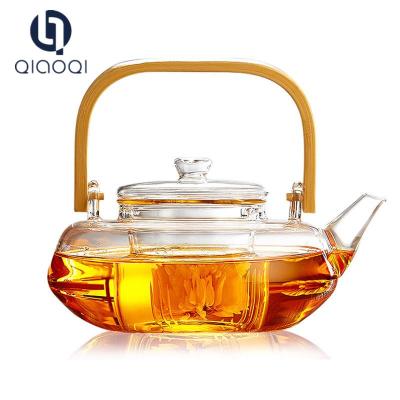 China 2018 heat resistant glass teapot tea pot with wooden handle for sale