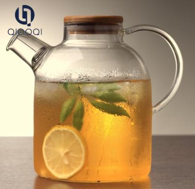 China 1L 1.6L Resistant Heat Glass Teapot with wooden lid for sale