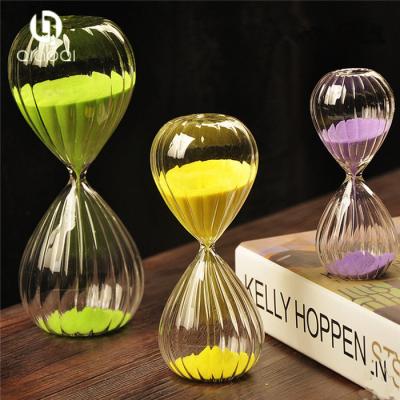 China beautiful vertical stripe pattern glass hourglass gift for sale