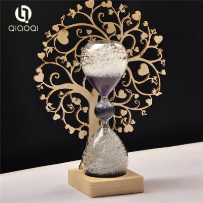 China Creative bubble hourglass with wood base Gifts and Souvenirs for sale