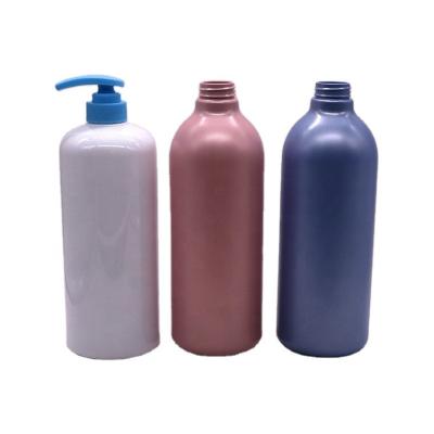 China Cap Type Pump 1000mL Capacity Round Bottles for Customized Color Lotion Body Wash for sale