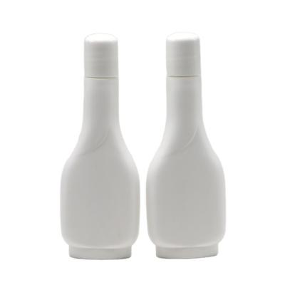 China 100 ml de frasco líquido plano de HDPE para loção ginecológica versátil multifuncional à venda