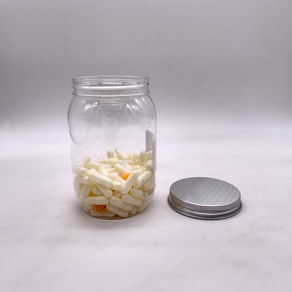 Quality Customizable 500ml PET Nuts Kernels Candy Bottle with Aluminum Lid for sale
