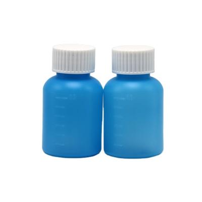 中国 工業用薬 60ml/2oz HDPEシロップボトル 白/青 不透明 紫外線防止 販売のため