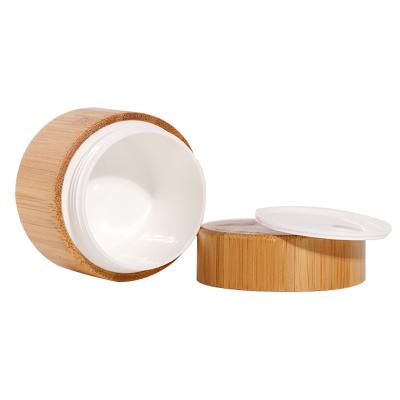 中国 Wooden Bamboo Jar Packaging 5g 15g 30g 50g 100g 200g Clear Frosted Glass Jar 販売のため
