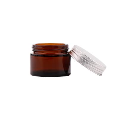 China Amber empty body cream cosmetic jars face cream glass jar with aluminum lid for sale