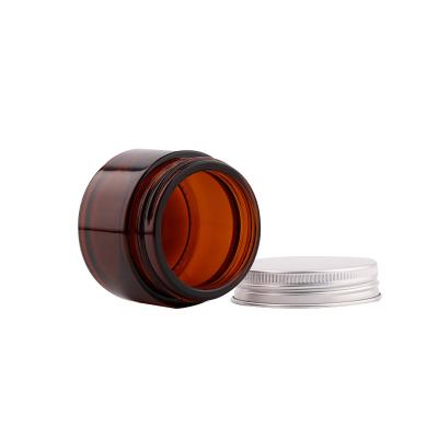 China 5g 10g 30g 50g 100g Clear amber glass cream jar with aluminium cap for sale