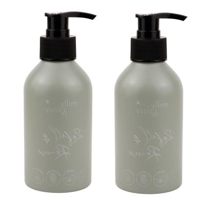 China 50x150mm 200ml Aluminum Cosmetic Bottles Refillable Shampoo Bottles With Pump for sale