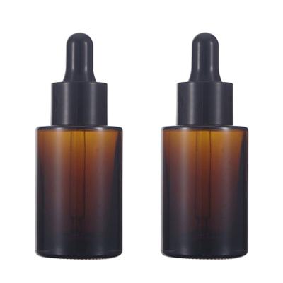 China Botella de aceite redonda de Amber Glass Cosmetic Serum Essential 15ml 30ml 50ml en venta