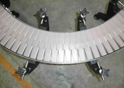 Quality Stainless Steel Turning Slat Chain Conveyor for Bottles and Tins for sale