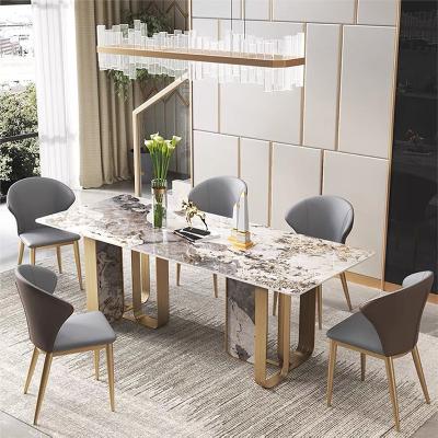 Chine Table de salle à manger longue en marbre italien personnalisée avec pieds en métal doré à vendre