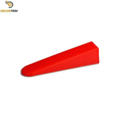 China PP Red Reusable Floor Tile Leveling Wedges For Ceramic Tile Leveling for sale