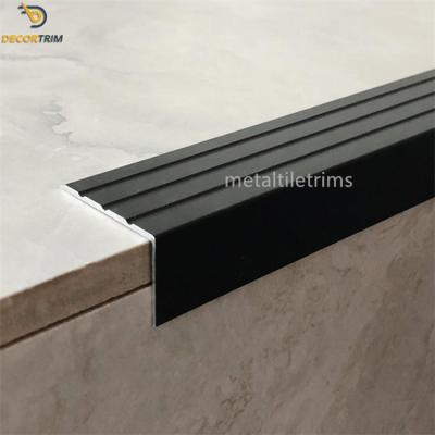 China Anodized Matt Black Aluminium L Shape Trim Stair Edge Stair Nosing Tile Trim for sale