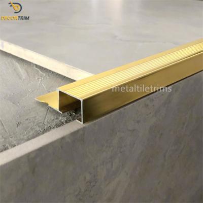 China 13mm Stair Nosing Tile Trim Box Shape Shiny Gold Color 6063 T5 Aluminum for sale