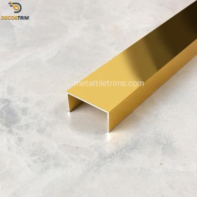 China Polish Shiny Gold U Channel Strip Aluminum 6063 T5 Ceramic Edge Trim en venta