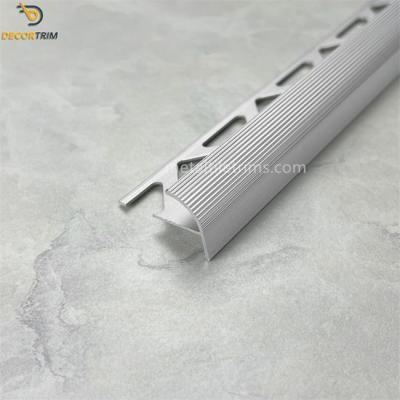 China Tile Trim 9.97mm Silver Tile stair Profile With Triangle Punching Te koop
