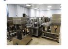 China Volledig automatische PE PP Euro Cap Assemblage Machine OEM Injectieflesvulmachine Te koop