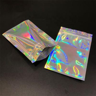 China Saco de embalagem com zíper holográfico de pé Bolsas planas Sacos plásticos pequenos com zíper a laser à venda