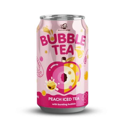 China Delight in the Sweetness of Taiwan Peach Bubble Milk Tea Canned Drink with Bursting Boba - A Fun and Flavorful Beverage for sale