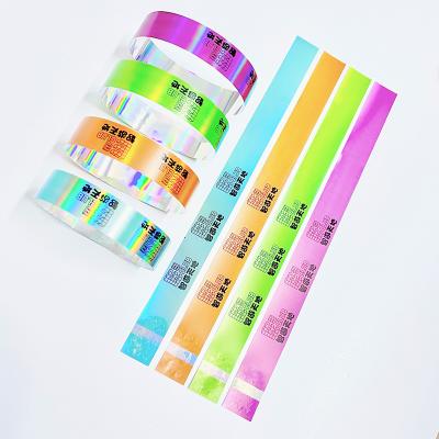 China Unisex Glitter Puñetazos de fiesta Impresión láser Brazalete ajustable en venta