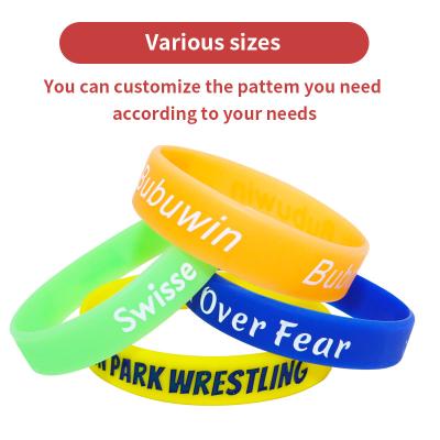 China Waterproof Debossed Silicone Wristbands , Colorful Printable Silicone Wristbands for sale