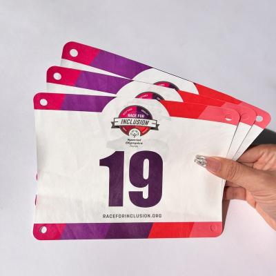 China Rectangular Race Bib Numbers High Tear Resistance in White Red Blue or Customized Colors for sale