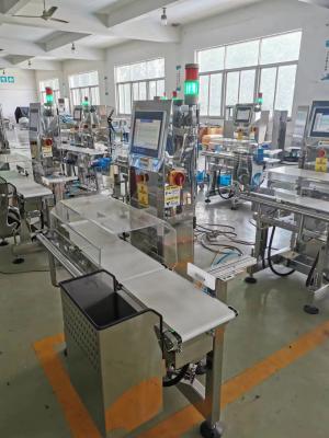 China Pesadora de verificación de alta velocidad para el proceso de clasificación automática del peso del producto en venta