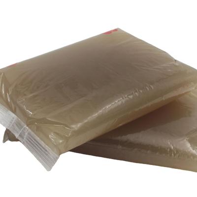 China Light Amber Fast Drying Hot Jelly Glue For Paper Gluing for sale