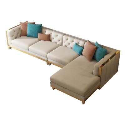 China Beige Tufted Chesterfield Sofa Genuine Leather Sofa Set With Brass Base for sale