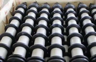 China Low Rolling Resistant JIS Rubber Disc Return Roller for sale
