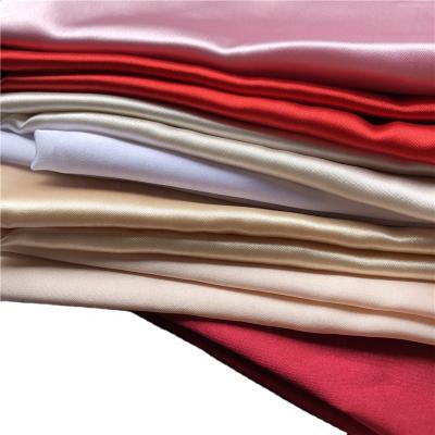 Китай Высоко блестящая полиэстерная спандэксная ткань для женской одежды, устойчивая к пятнам 50D*75D продается