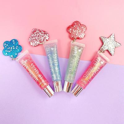 China Exquisite Childrens Lip Gloss 7ml Shimmering Glitter Lip Oil With Cute Pendant for sale