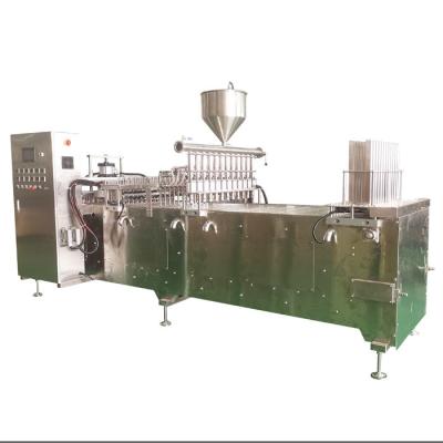China High Accuracy Cup Filler Packaging Machine Honey Spoon Filling With PLC Control System for sale