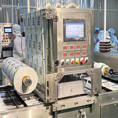 Chine 380V contrôle PLC machine automatique de scellage de plateau alimentaire en plastique à vendre