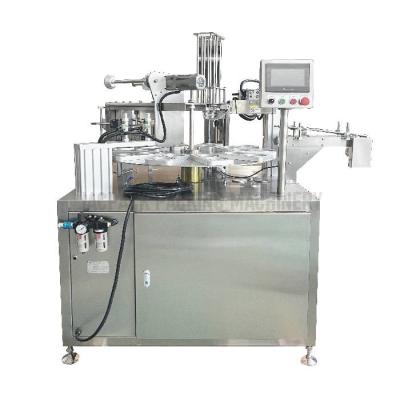 Chine Machine de remplissage et d'étanchéité de tasses rotatives en acier inoxydable 304 pour sauce à vendre