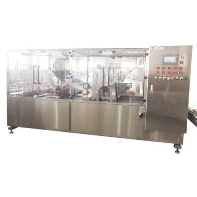 China Chilli Sauce Tray Filling Equipment 5-50ml Plastic Container Packaging Equipment for sale