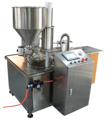 China Touch Screen Plastic Cup Filling Sealing Machine for Liquid/Sauce Packaging with Gas Flushing and Vacuum Tray à venda