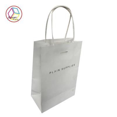 China Boutique White Printed Paper Bags Surface Technology Color Printing for sale