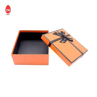 China Durable Orange Bowknot Cardboard Gift Packaging Box Rectangle Storage Cardboard for sale