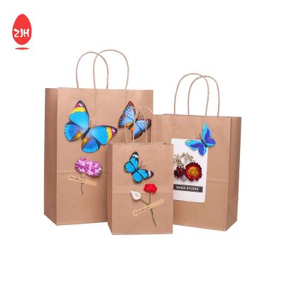 China Design Logo Eco Friendly Gift Packing Bags Kraft Paper Shopping Bag With Handle for sale