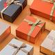 China FSC UV Coating Orange Cardboard Box Gift Rigid Packaging Box With Ribbon for sale