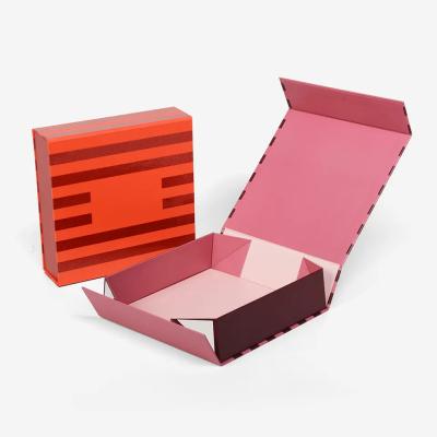 China ECO Cardboard Book Shaped Paper Box Cosmetic Dress Custom Folding Magnetic Gift Box for sale