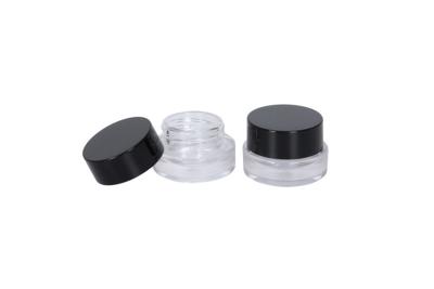 China 5G / Tarros de cristal claros de la ronda 5ML con el cosmético negro Conatiner de la crema de la loción de la fundación del maquillaje de las tapas en venta